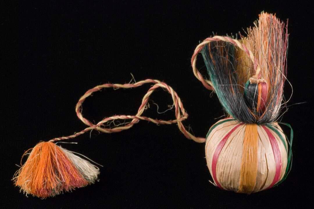 Natural raupō poi with coloured stripes & a long-plaited tassel